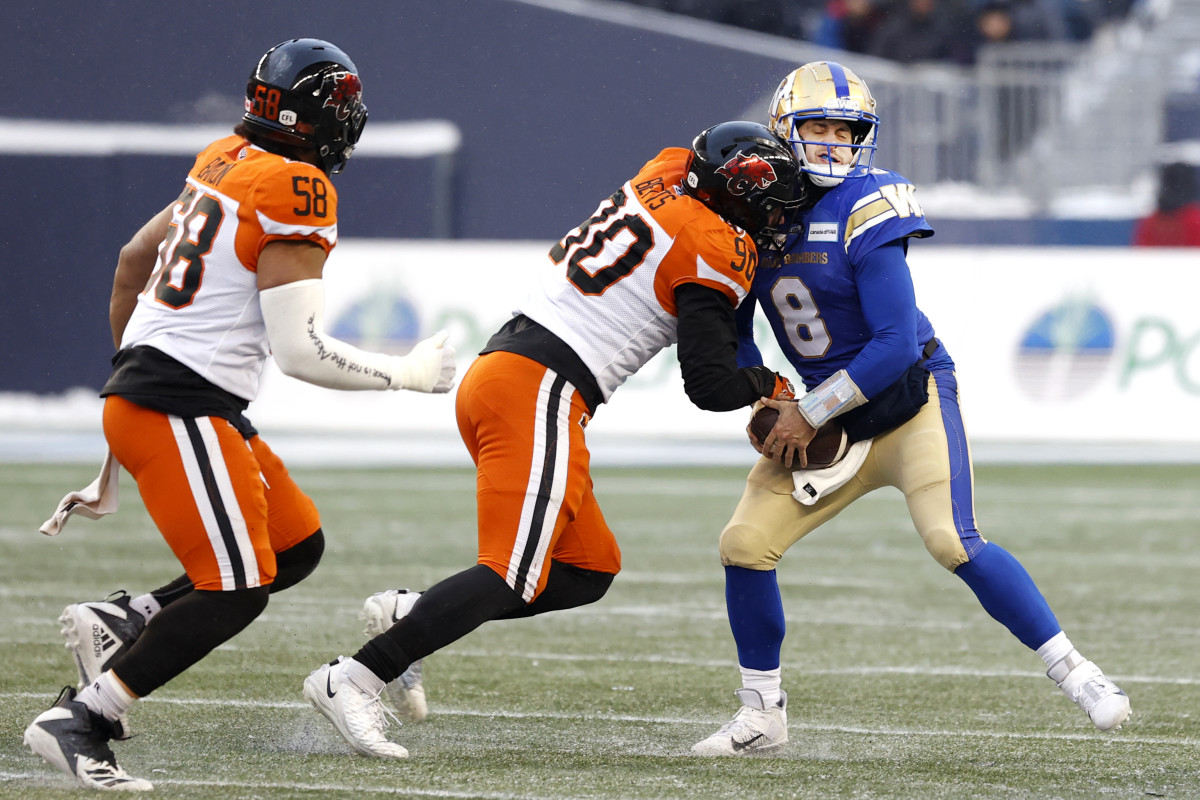 Nov 13, 2022; Winnigeg, Manitoba, CAN; BC Lions defensive lineman Mathieu Betts (90) tackles Winnipeg Blue Bombers quarterback Zach Collaros (8) in the first half at Investors Group Field. Mandatory Credit: James Carey Lauder-USA TODAY Sports